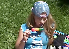 teen 18+ rubbing her clit outdoors