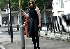 Wondrous Transvestite tugging out side the post office