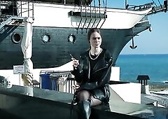 Nice-looking youthful Russian cutie smokin' one cigarette outdoors on terrace, natural daylight, relaxed mood, soft expressions, casual lifestyle