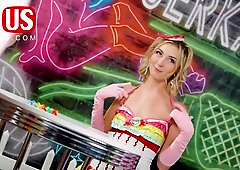 Sheena Ryder and Chloe Temple join a tattooed man in a neon-lit lingerie game show threesome