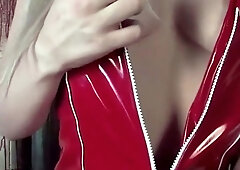A blonde teen legitimate in a crimson sundress solo