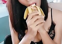 Ladyboy Meena Enjoying a Banana