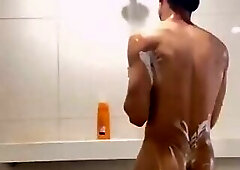 Uncut Chinese boy bathing in a public swimming pool