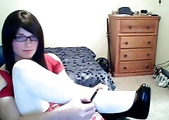 T-girl in stockings sniffs her feet and teases on webcam