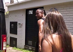 Long-haired brunette takes thick cock in the ass in a banged-up van