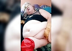 Wicked Bat Angel (Nurse Vicki in dress) Is a 60 and still wild about sex and we discover her masturbating with her suit and gold mask and gloves on un