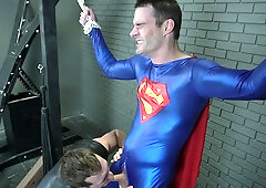 Dominant stud gets anal drilled by his male slave in a superhero costume
