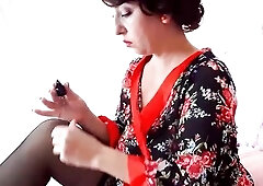 Polish nails Vintage housewife Regina Noir in red pants widens legs wide