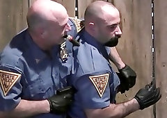 Policeman strings up his buddy for hardcore gay fucking