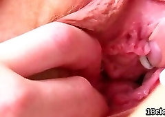 Lovely teen is opening up narrow fuckbox in close-up and cumming