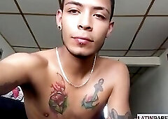 Inked slim Latino gets nude and masturbates on couch