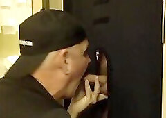 Dirty gay men sucks and jerks off cock in gloryhole