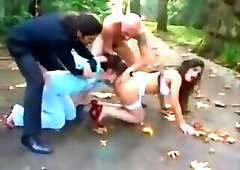 Two men and a woman fuck shemale outdoors
