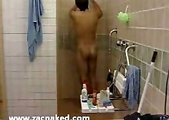 Two blokes showering