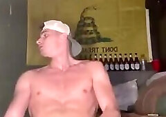 Muscular Dude Jacking Off Below The American Flag And In Front Of The Gadsden Flag
