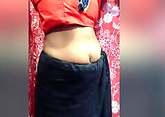 Indian Housewife In The Bluesaree Enjoying