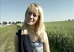Golden-haired teen disrobes nude outdoor