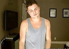 Cute gay dude smokes while stripping and stroking his dick