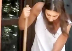 Woman cleaning the apartment boobs downblouse