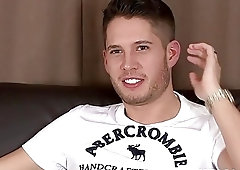 Handsome twink strips and jerks off after an erotic interview