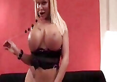 Horny blonde tranny with monster tits vigorously fucks a fleshlight