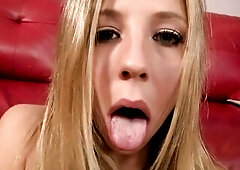 Chastity in a short pink costume walks in to a living room and  gives a dude a blow job.  The dude takes off his thong and puts it around Chastity