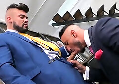 Wearing a suit and having office sex with a tall hunk