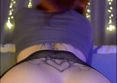 A Redhead With Blue Eyes In A Net Passionately Rides A Dildo And Plays With Cum