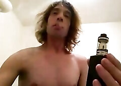 Topless Transgirl Laying Down Some Vape Fog