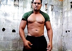 Muscular amateur star Yuri Gaucho showcases his hefty uncut cock for a steamy handjob