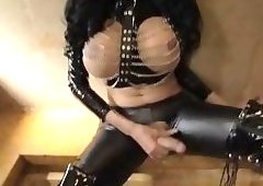 TS in latex fucks guy in mask