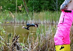 Lezdom sexy girl in erotic ass fucking domination by a quiet serene river