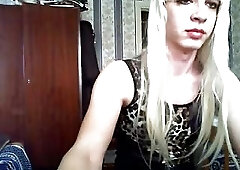 Blonde Russian shemale in sexy dress jacks off on webcam