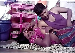 Indian village wife passionately kisses her husband in front of their mansion