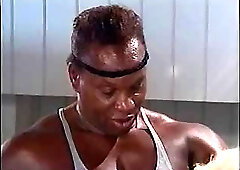 Sexy blonde sucks on a huge black dick and gets drilled by the motorcycle