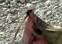 dudes inhaling on the beach