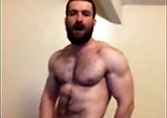 Hairy British Hunk Jacks Off