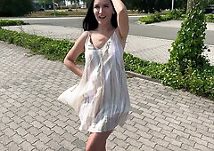Long-haired beauty teases in sheer dress as vibrator play builds to changing room tension