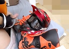 Jizz on biker boots and helmet during playful dildo session