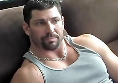 Muscle Lad Plays With A Dildo