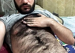 Preparing to stroke myself by playing with my hairy body