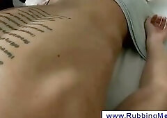 Man getting a massage from another man