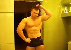 RUSSIAN BODYBUILDER STRIP AND CUM