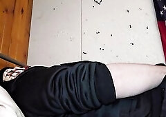 Trans guy in skull mask and gear uses a toy