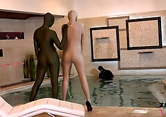 Two Zentai Girls With Slave In Pool - Watch4Fetish