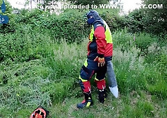 Forest Worker Pup Pawing Off In Gear And Boots (outdoors)