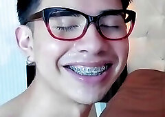 beautiful teen fag gets cum all over his braces and glasses