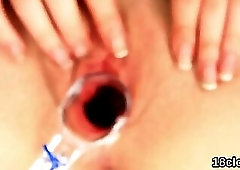 Fervent cutie is stretching soft slit in close up and cumming