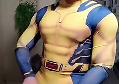 Hunky Wolverine jerks off solo