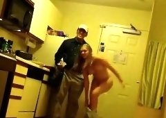 A nude with a pizza.